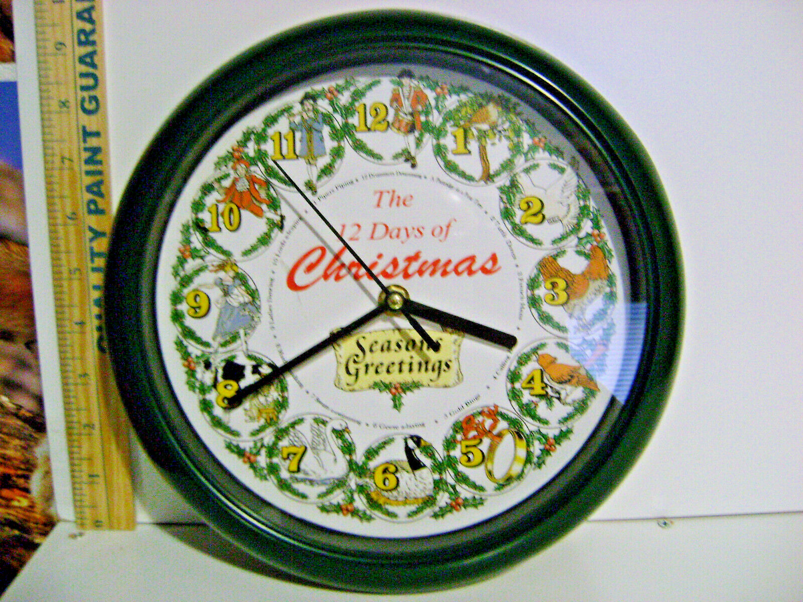 10" CHRISTMAS SONGS WALL CLOCK (PLAYS DIFFERENT 12 SONGS 1 EVERY HOUR