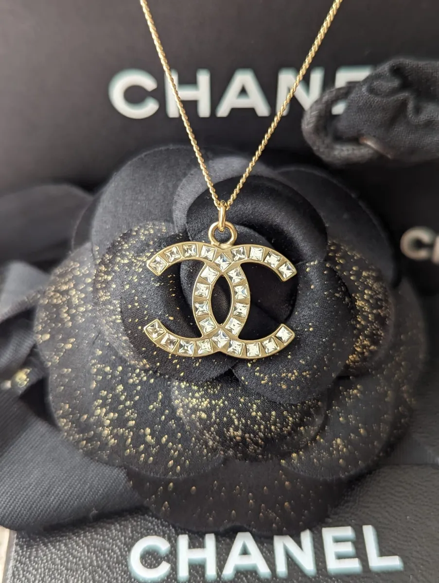 silver chanel charms