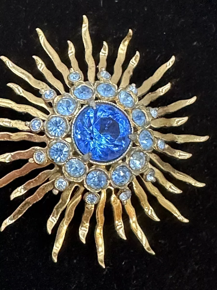 Sunburst brooch deals