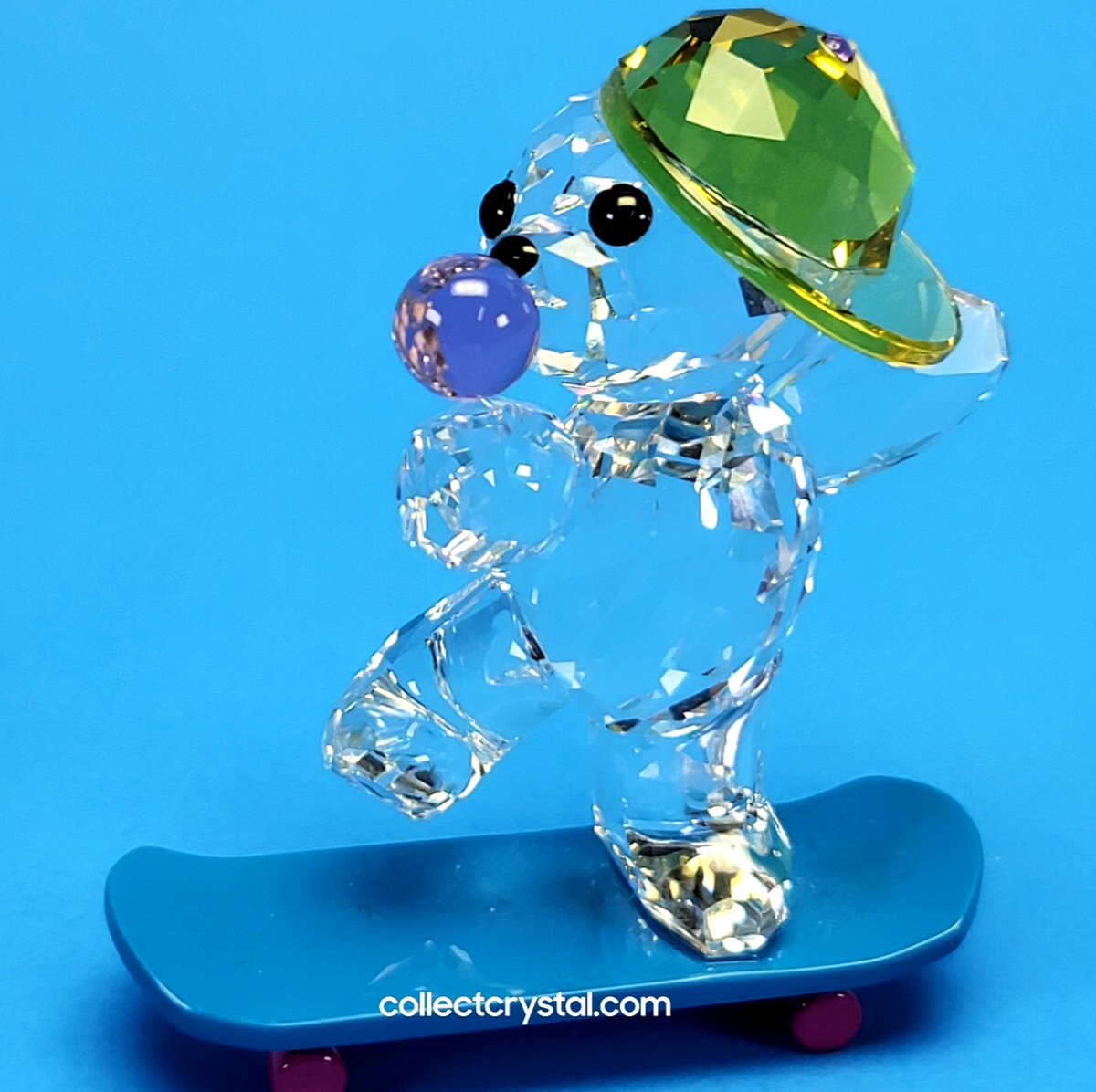 Swarovski # 5619208 Skaterbear Kris Bear Crystal Figurine on a