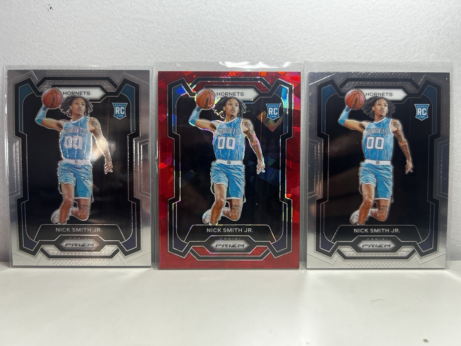 2023-24 Prizm Nick Smith Jr. Red Ice Prizm Rookie #135 Hornets