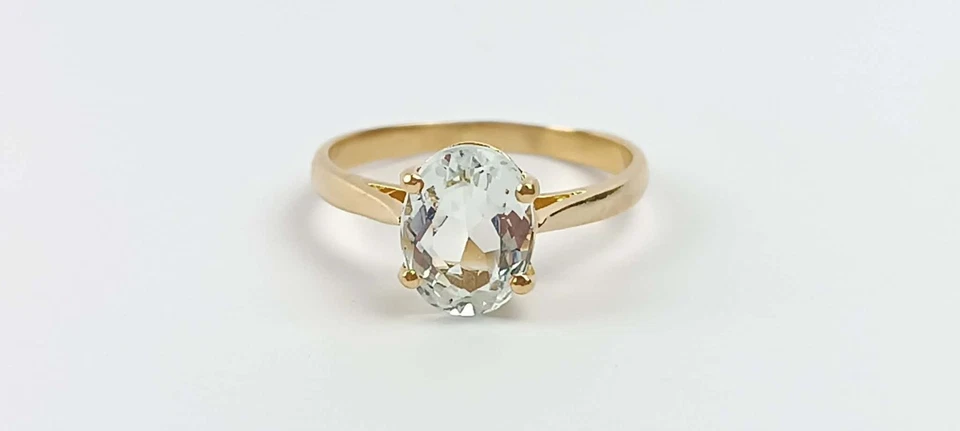 T 54 Bague solitaire or jaune 18 carats aigue marine blanche - Photo 1/4
