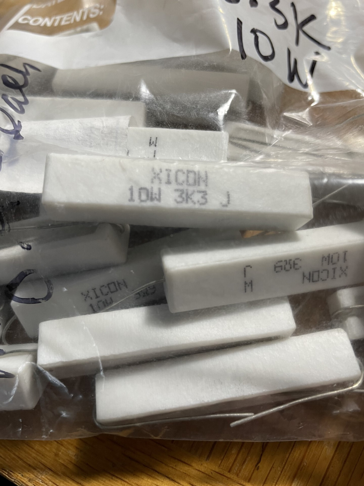 A lot of THREE (3) XICON 3,300 Ohm 10 Watt Wirewound Ceramic Power Resistors.
