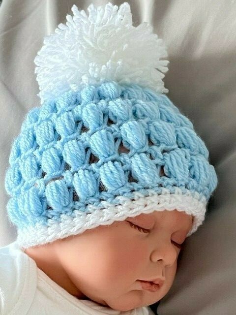 Brand New hand made crochet baby hat ,blue and white with pom pom