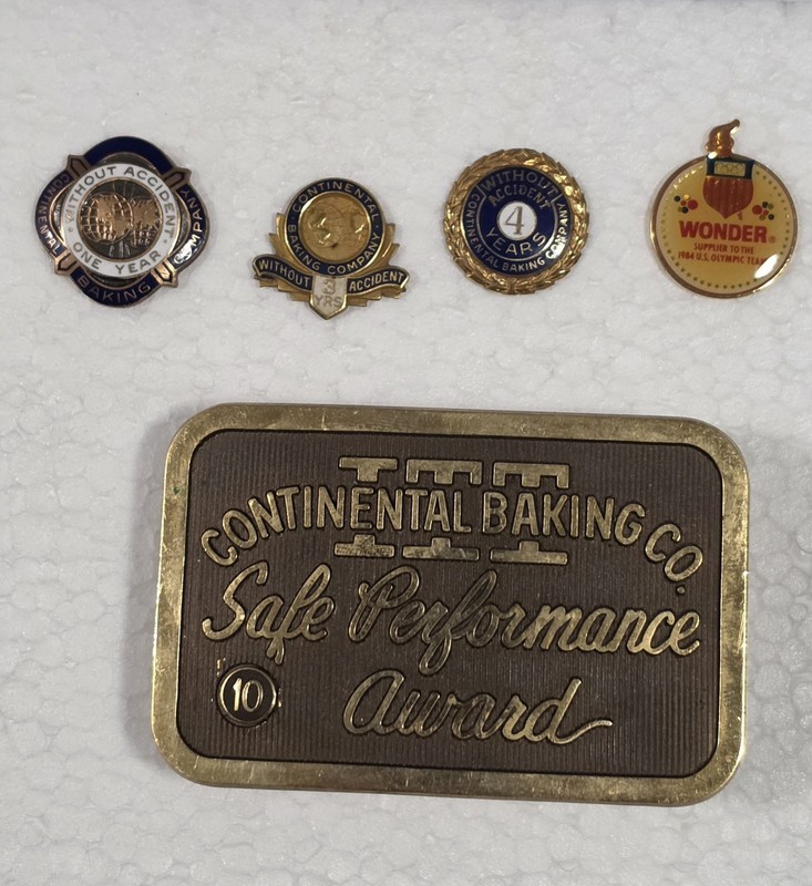  Vintage Continental Baking Company Multiple Years Safety Lapel Pin Belt Buckle.
