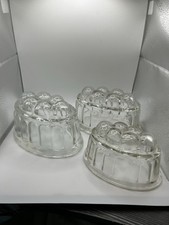 Pair of Vintage glass jelly moulds one large, one small excellent condition