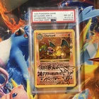 Mitsuhiro Arita Signed 1999  #4 Charizard Holo shadowless PSA/DNA 8 AUTO 10