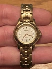Seiko Ladies Vintage Watch Gold Bracelet White Dial 100M Japan Quartz Date RUNS
