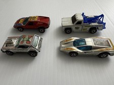 Redline Hotwheels Lot of 4 1970  s. All Different Good Condition See Photos