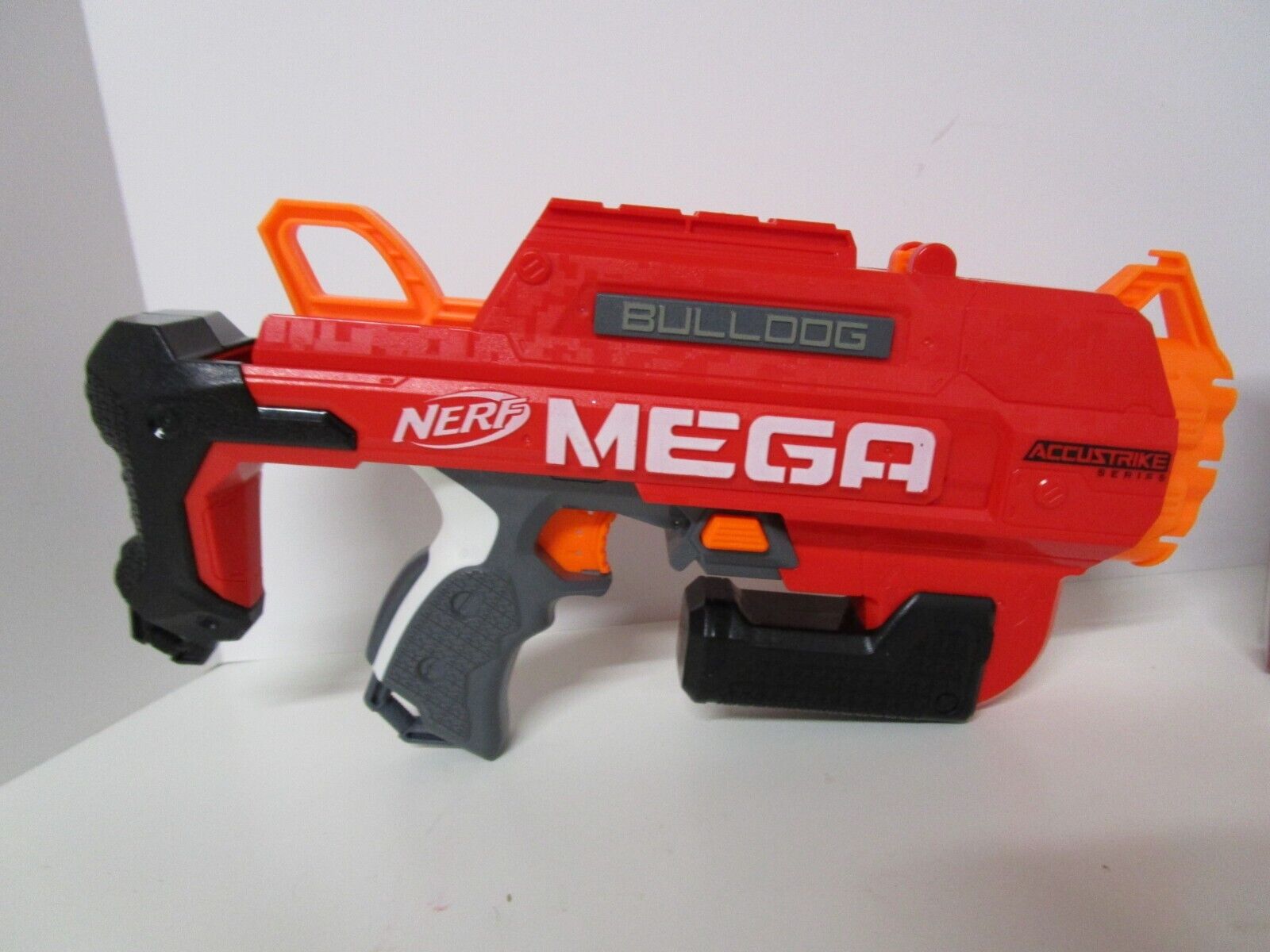 Lança Dardo Accustrike Mega Bulldog, Nerf, Vermelho/laranja