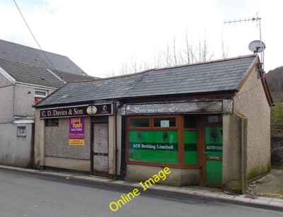 Photo 6x4 Betting shop and a former butchers shop in Cwmaman Viewed acros c2014