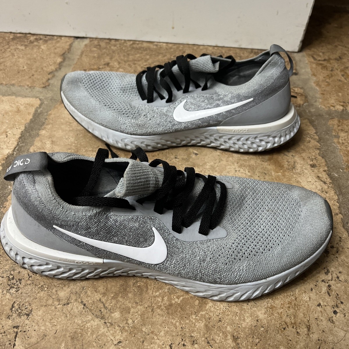 nike epic react flyknit black on feet