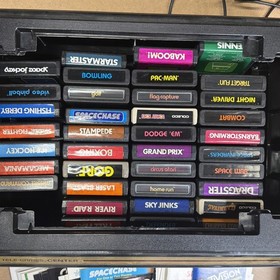 Atari 2600 System Bundle with Console, 37 Games, Joystick, Manuals, and More LOT