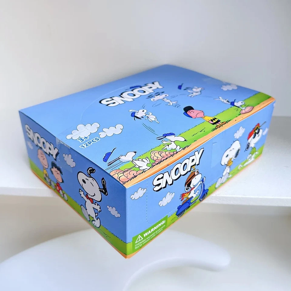 12pcs Peanuts Snoopy Blind Box Keychain Figures – Egg Capsule Mystery Toy Set - Image 3 of 4