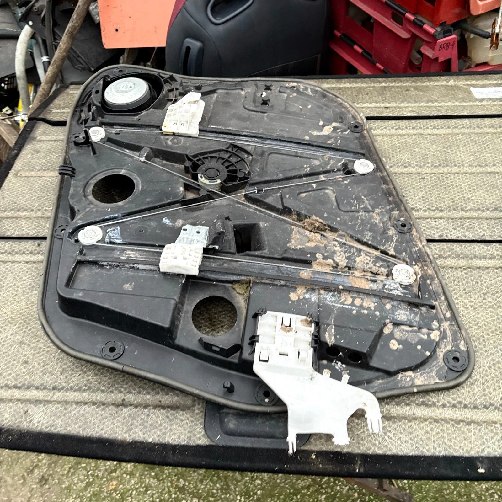 Rear view of Kia Soul window regulator cable and rail mechanism