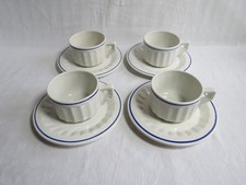 4 tasses à dejeuner sur soucoupes à liserés bleu,porcelaine de gien