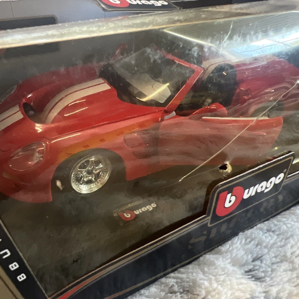 Nuevo en caja Bburago Bijoux Collection 1:24 Die Cast 1999 Shelby Serie 1 Roadster Foto 3 de 4