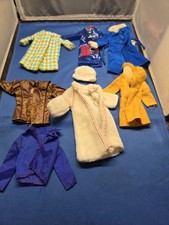 Lot of seven vintage barbie coats.Please see photos for condition