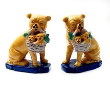 STAFFORDSHIRE MINATURE BULLDOGS HOLDING PUPPIES IN BASKETS ON BLUE BASES