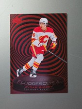 2025-26 Upper Deck Series 2 Hockey Fluorescence Aydar Suniev F-12 Calgary Flames