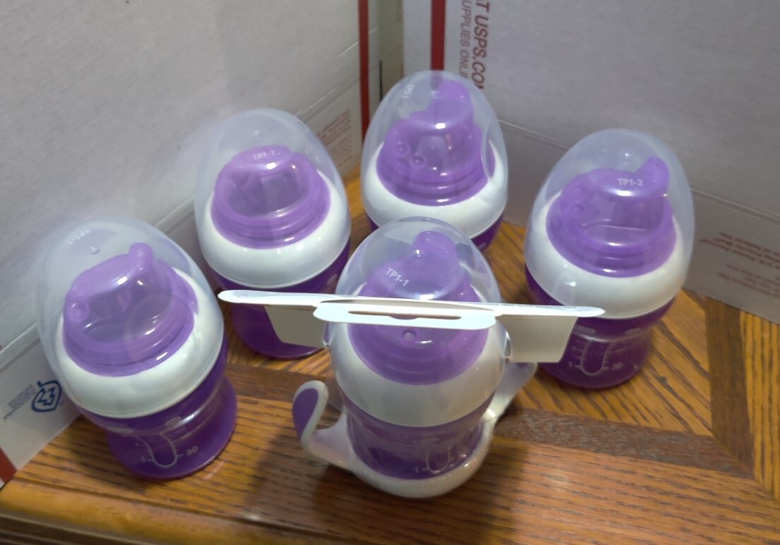 Six Munchkin sippy cups, bottles, Transition Trainer Cup, 4 Ounce, purple 