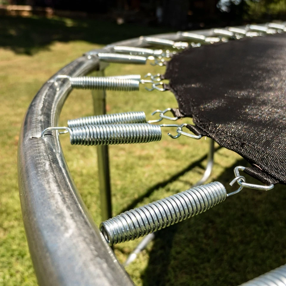 Trampolín Jumpking Ovalado 10' x 15', con Dos Aros de Baloncesto, Azul/Amarillo Foto 3 de 4
