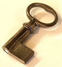 Small mild steel kidney bow key blank. Antique tea caddy writing box lock wards