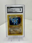 1999 Base Set 1st Edition Machamp 8/102 Holo Pokemon Card CGC 8