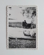 Funny boy garden stroller - old photo snapshot