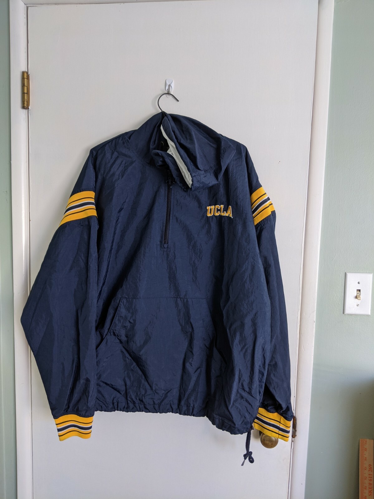 jacket. Zippered neckline hand warmer 