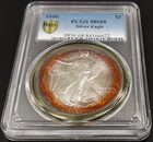 1990 Silver Eagle certified MS 68 by PCGS! Incredible toning!