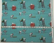 NEW cotton Christmas fabric half yard - Peanuts Snoopy N Woodstock On Blue