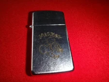 Year 2005 Satin Chrome Zippo Slim Lighter with MICKEY MOUSE Inscribed Logo