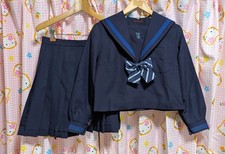 E101  Japanese SchoolGirl Uniform Winter Navy. M. School Logo. Good 
