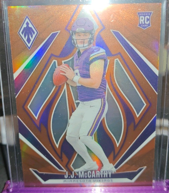 2024 Panini Phoenix - Rookies J.J. McCarthy #185 Orange (RC)