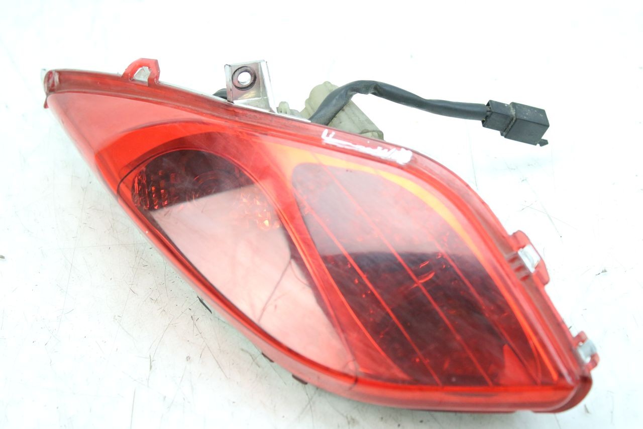 FARO TRASERO IZQUIERDO - MBK SKYCRUISER 125 (2010 - 2013)
