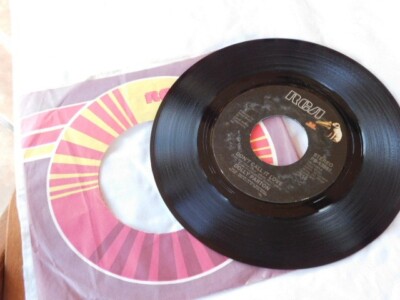 DOLLY PARTON DON'T CALL IT LOVE / WE GOT TOO MUCH 45 RPM RECORD 056
