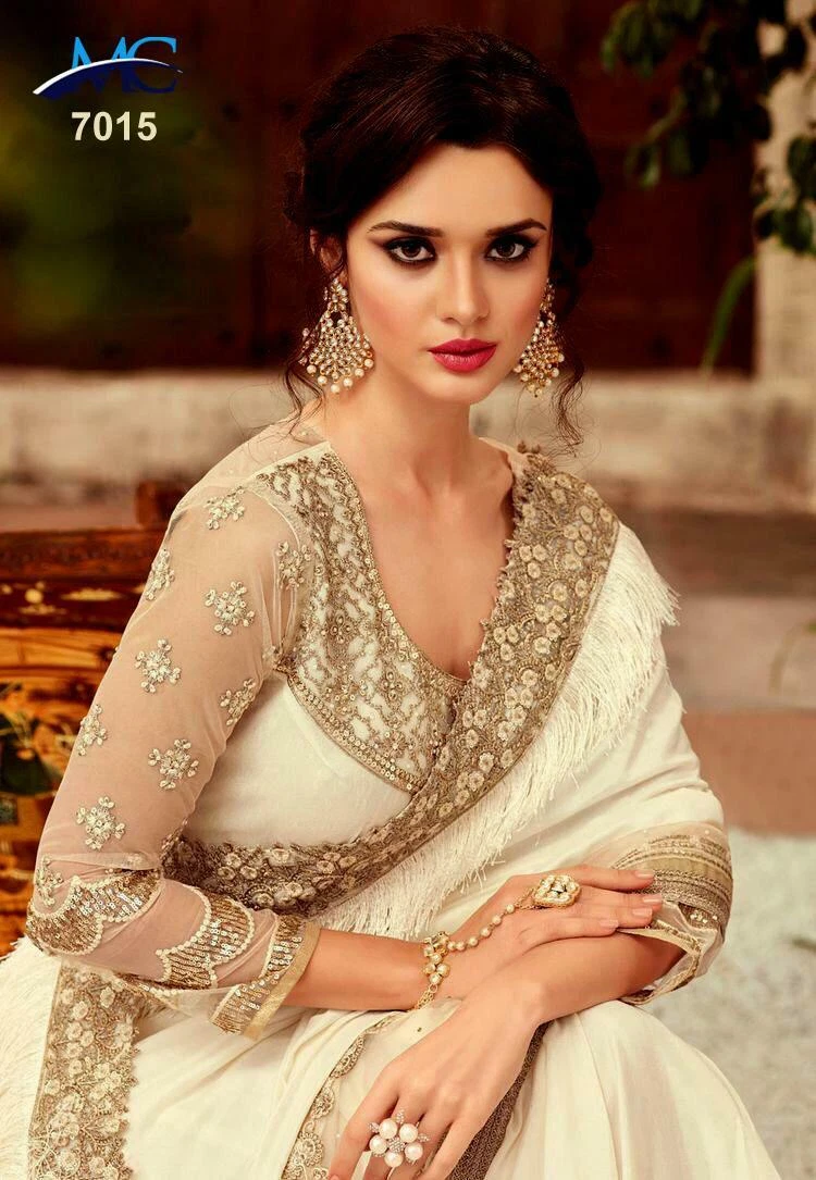 Kriti Sanon looks divine in a pearl white lehenga saree | TOIPhotogallery