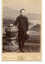 Little Boy-Walker's Art Studio-Props-Backdrop-Kansas-Vintage Cabinet Photograph