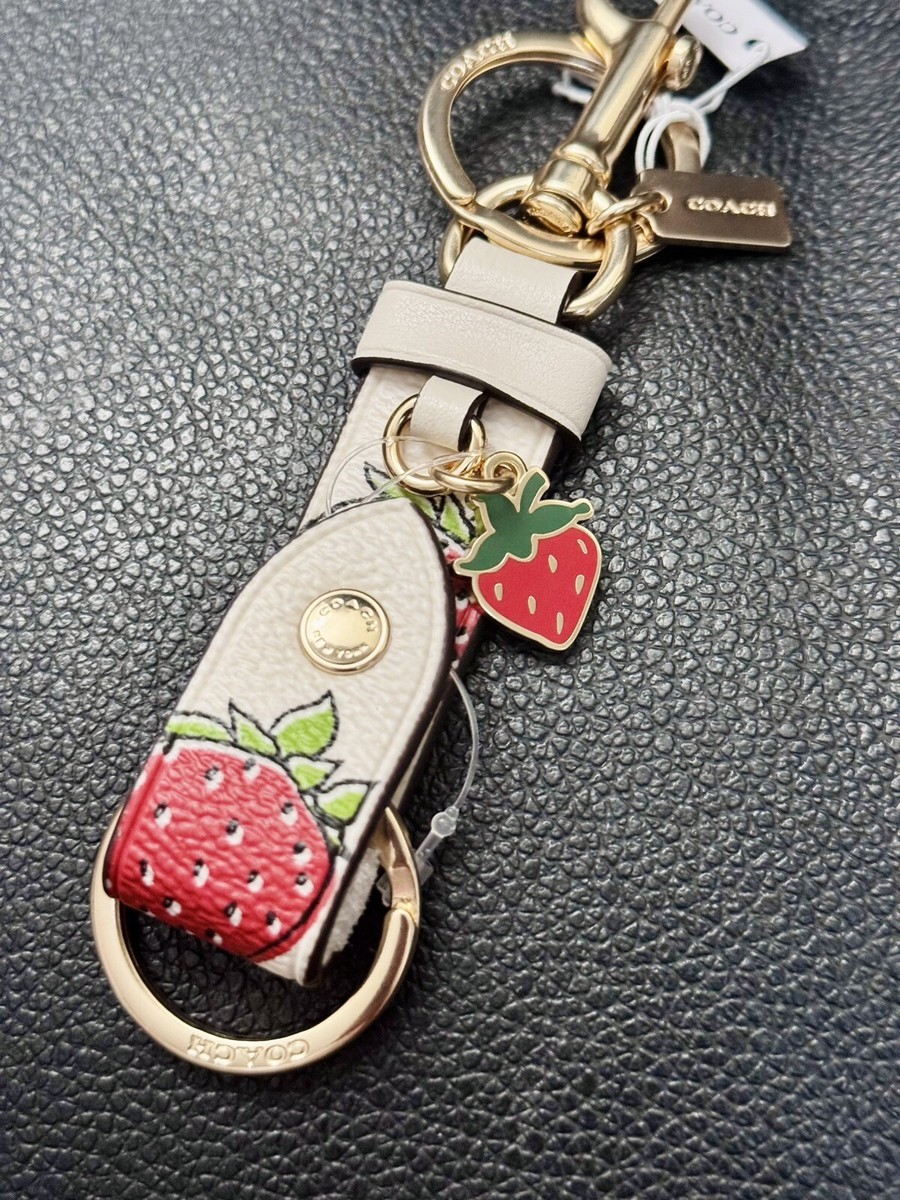 COACH。フリンジキーホルダー 32227gld.jpg