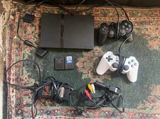 Sony PlayStation 2 Slim With 9 Games, 2 Controllers, Cords, and Memory Cards,
