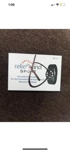 Relief band sport Black works perfect used With brand new gel (NO CHARGER)