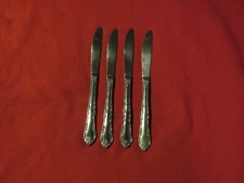 Cambridge stainless table knives, 4 matching pieces, China