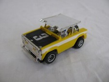 Aurora AFX HO Non-Magnatraction Yellow Ford Baja Bronco w/ Mean Green 1769 EX