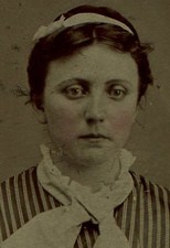 WOMAN, BIG SOULFUL EYES, STRIPED DRESS. TINTED TINTYPE, PERIOD PAPER MAT.