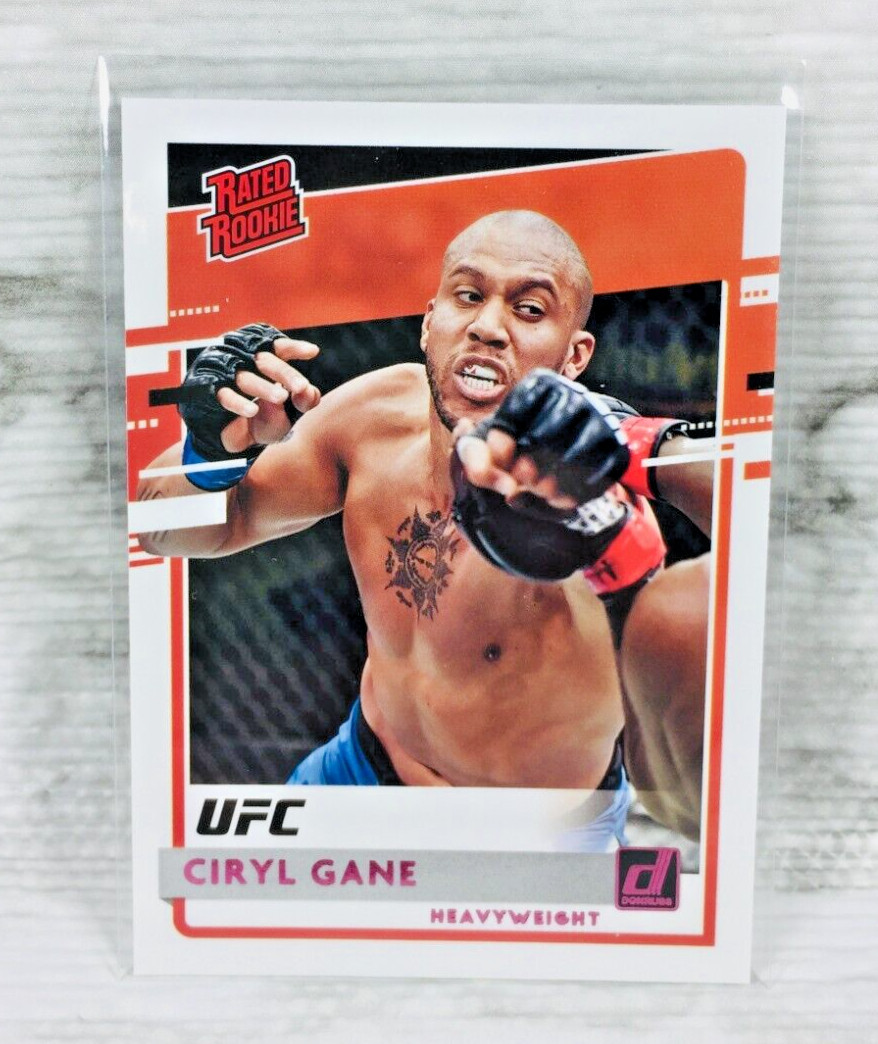 2021 PANINI CHRONICLES UFC #28 "CIRYL GANE" PINK FOIL RATED ROOKIE RC (DONRUSS)