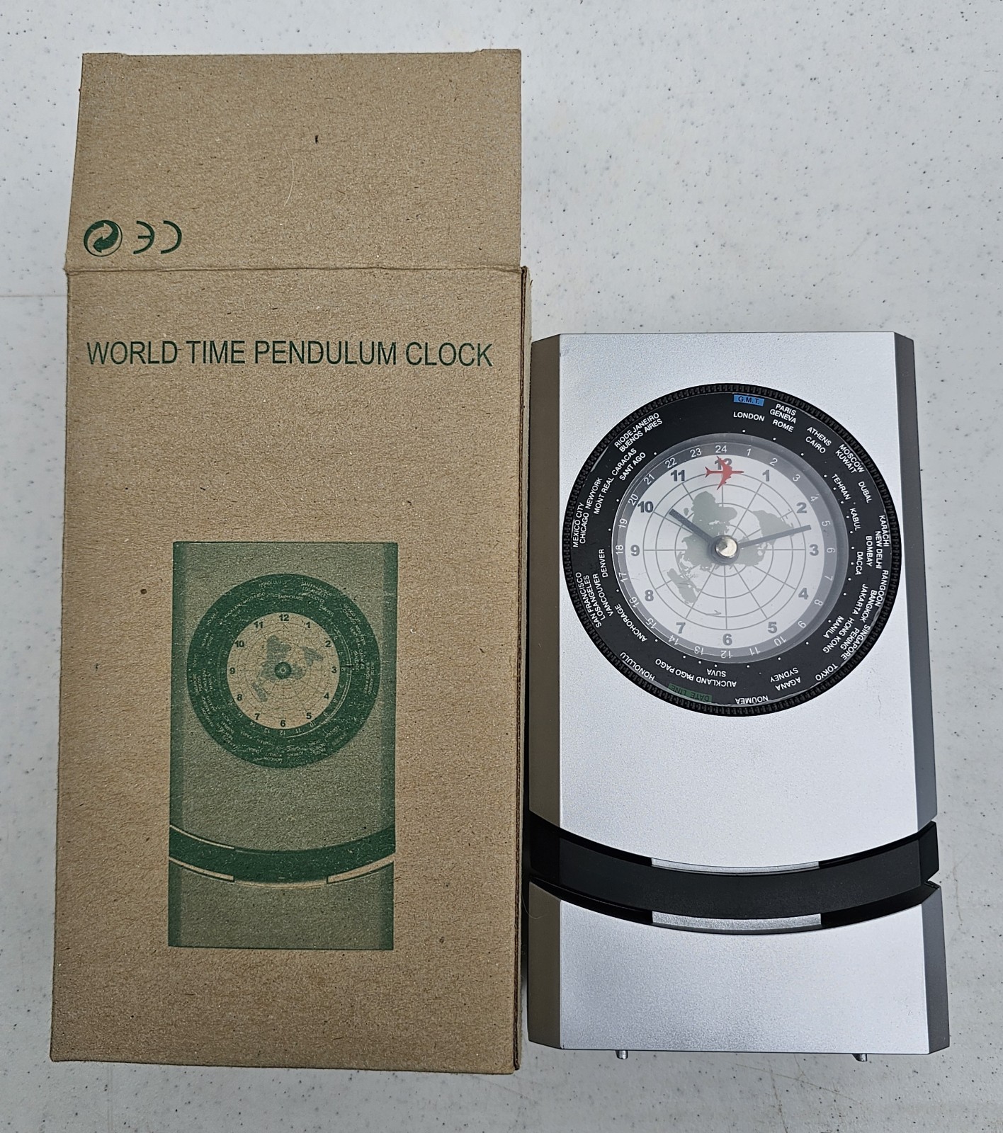 World Time Zones Clock (Silver And Black With Moving Pendulum)