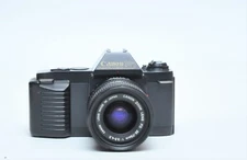 Canon T50 Film SLR Camera W/FD 35-70mm F3.5-4.5 Lens SN 1493823