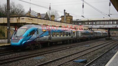 PHOTO  CAF CIVITY CLASS 397 5-CAR TRAIN AT PLATFORM 4 LANCASTER STATION THE MAIN