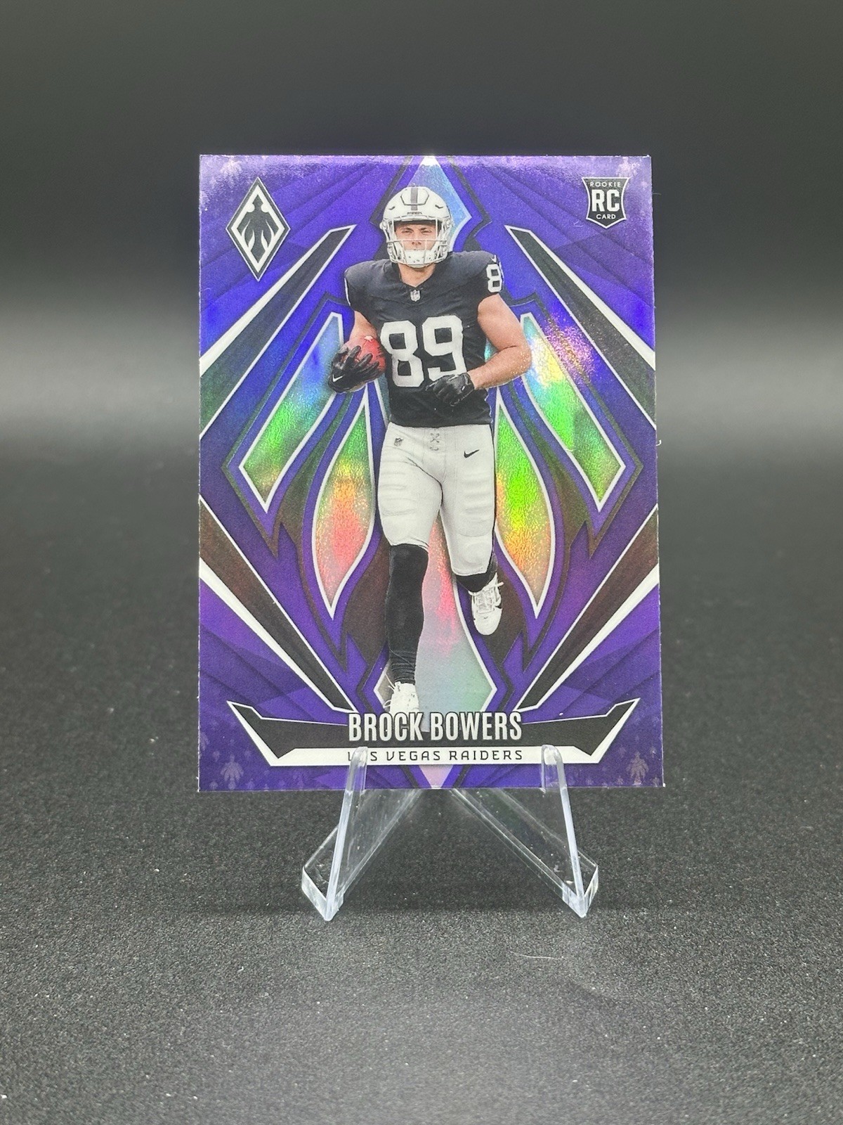 2024 Panini Phoenix - Rookies Brock Bowers #165 Purple (RC)